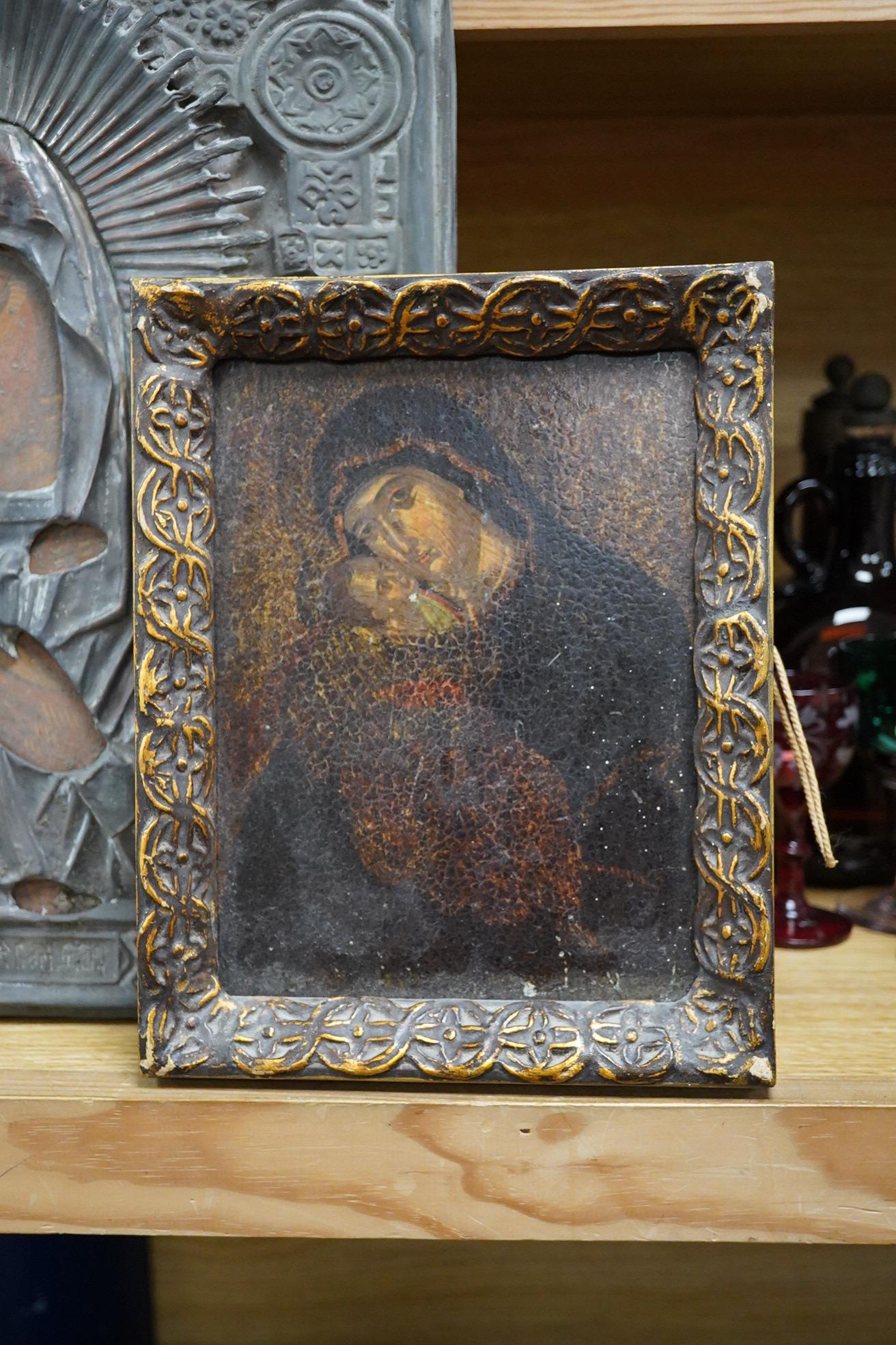 A Russian overlaid icon and a printed icon, largest 35 x 30cm